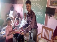 School stationery distribution program-Damini-Neral